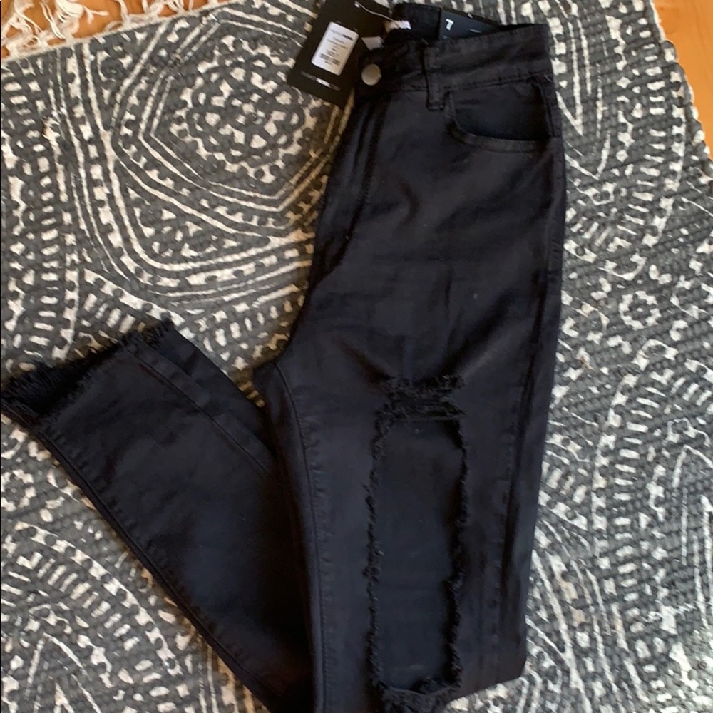 black distressed jeans